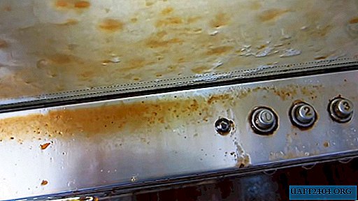 How do I get rid of stubborn traces of fat on a cooker hood in 5 minutes