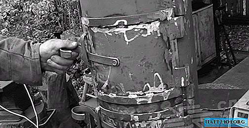 Cómo hacer una estufa de barriga con un tanque de propano de 50 litros