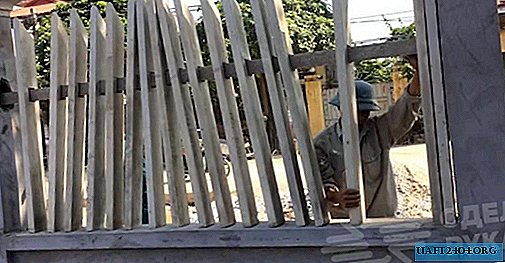 Cómo hacer e instalar defensas de concreto para una cerca