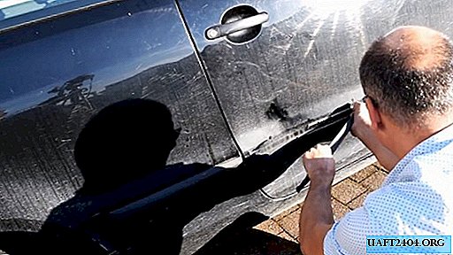 Hoe een deuk in een auto met kokend water en zuiger gemakkelijk recht te trekken