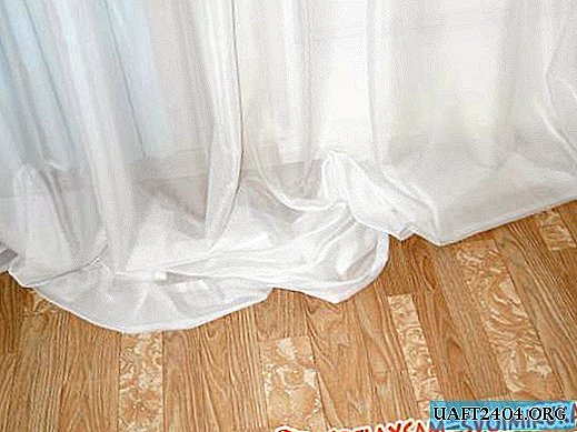 Cómo dobladillar una cortina