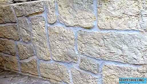 Bagaimana untuk membuat tiruan batu pada dinding konkrit