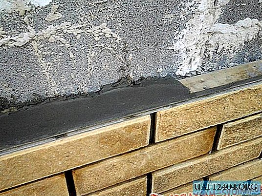 Ladrillo: cierre la pared de bloques de hormigón con un fagot estrecho