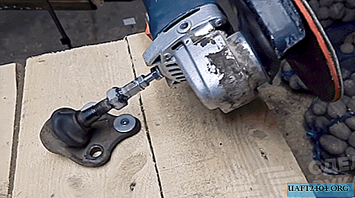 Mounting for angle grinders on a workbench from a ball joint