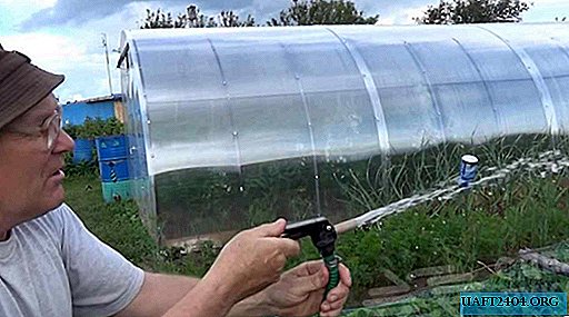 Irrigation hose nozzle made from an old fire extinguisher