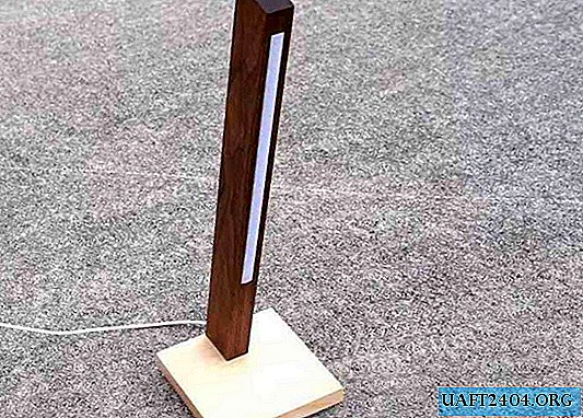 Table lamp with hidden wireless charger