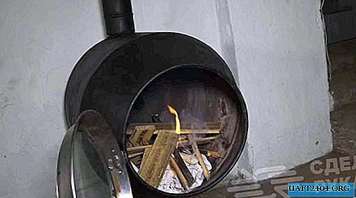 Mounted wood stove from an old concrete mixer