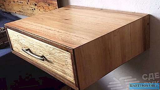 Unusual wooden shelf with drawer