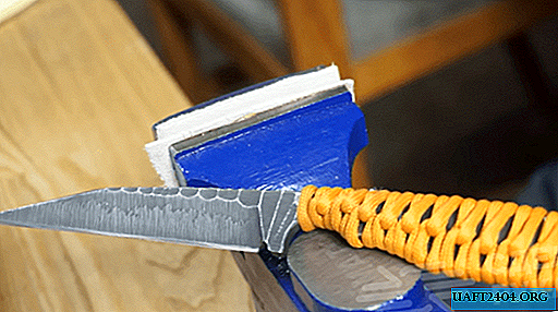 Couteau original en acier à outils ordinaire