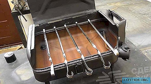 Camping barbecue from an old metal canister