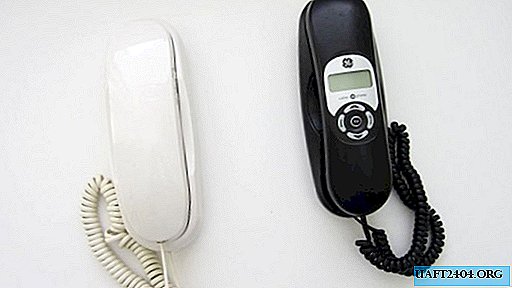 Un simple interphone d'une paire de vieux téléphones filaires