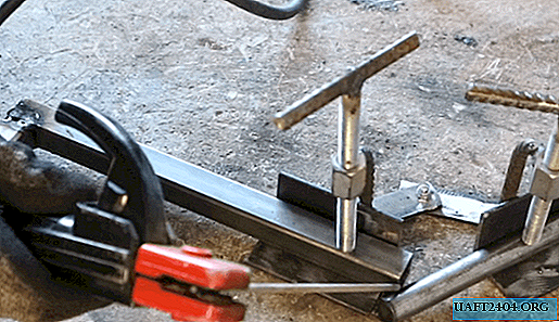 Adjustable clamp for welding at an angle