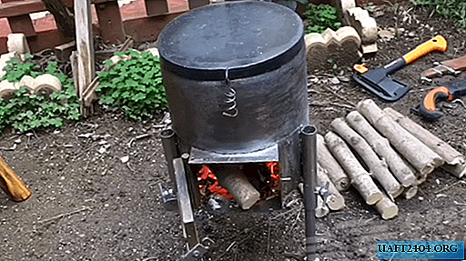 Mini horno casero para el hogar y el jardín desde un cilindro