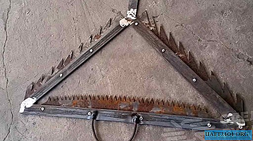 Homemade rake to clean the bottom of a reservoir or river