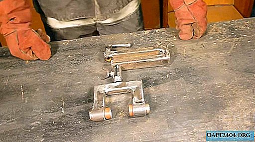 Selbstgemachter Schraubstock für einen Messermacher aus improvisierten Materialien