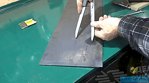 Homemade compass for drawing on metal workpieces