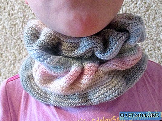 We sew a comfortable scarf for a child