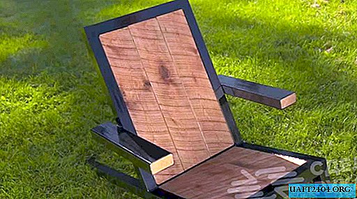 Elegante silla de exterior de metal y madera.