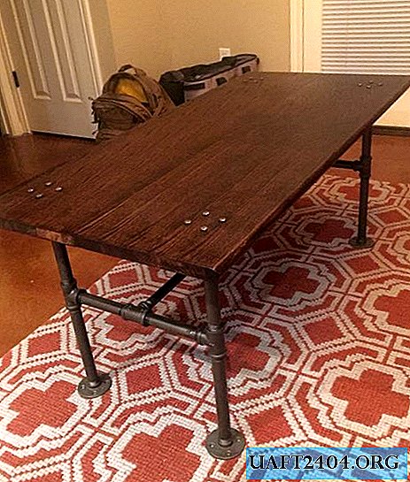 Retro style table with pipe base
