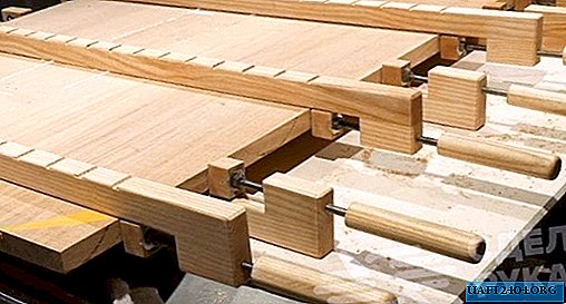Klem bengkel tukang kayu untuk menempelkan papan dan countertops