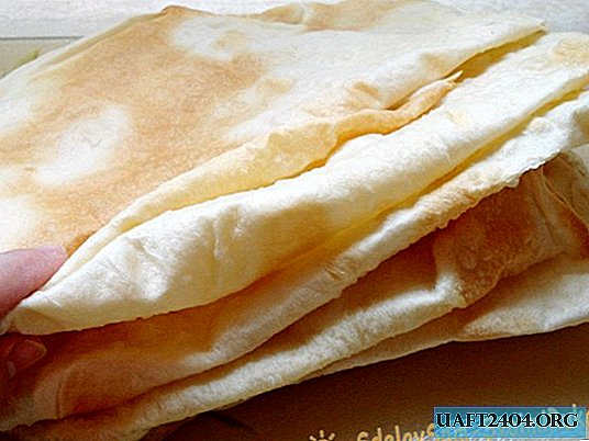 Thin Armenian pita bread in the oven