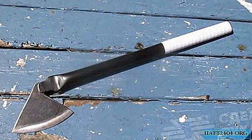 Machado de um pedaço de lâmina de serra e tubo de aço
