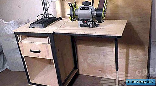 Tool storage cabinet with folding table