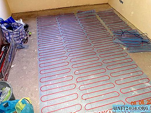 Laying tiles on electric heated floors