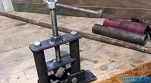Vertical mini vise for fixing round pipes