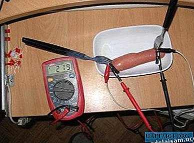 Frying sausages with electric current.
